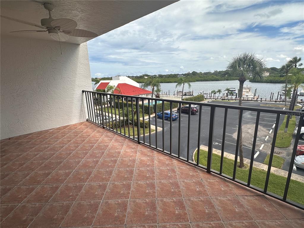 a view of a balcony with an outdoor space