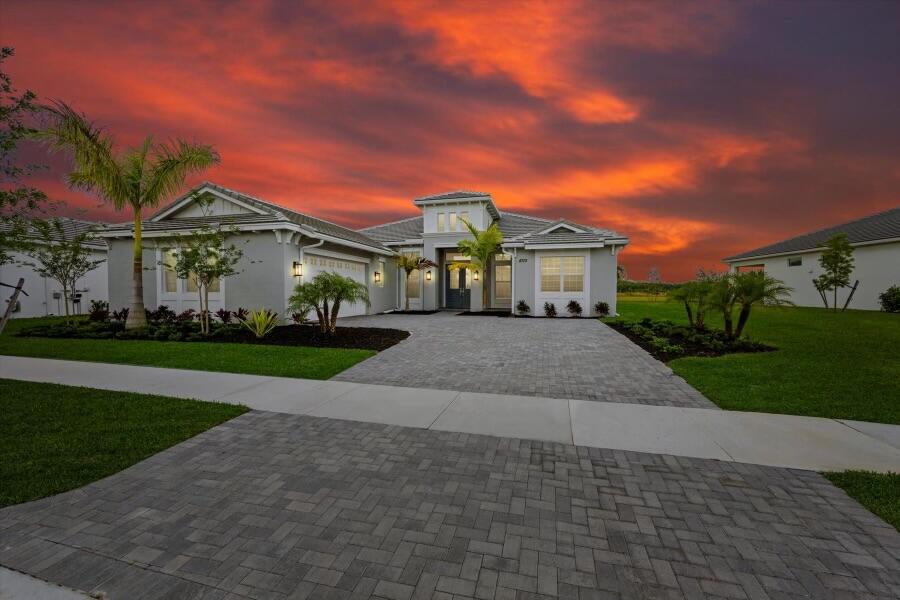 front view of a house with a yard