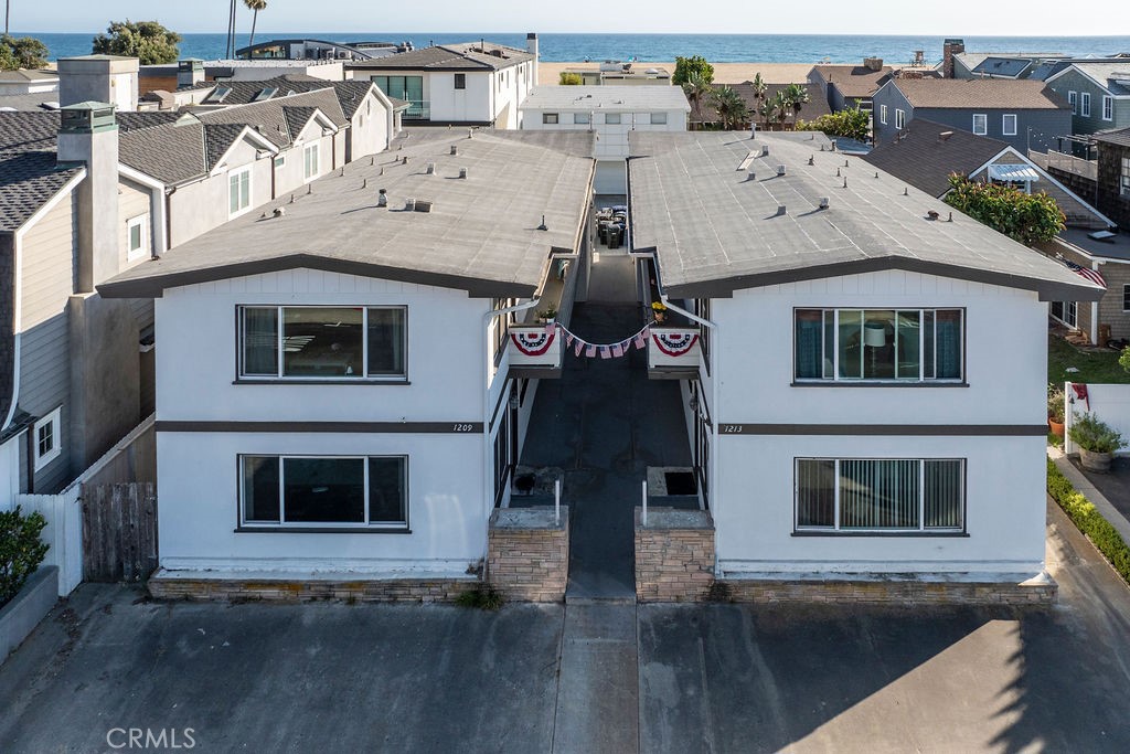 an aerial view of a house with a balcony