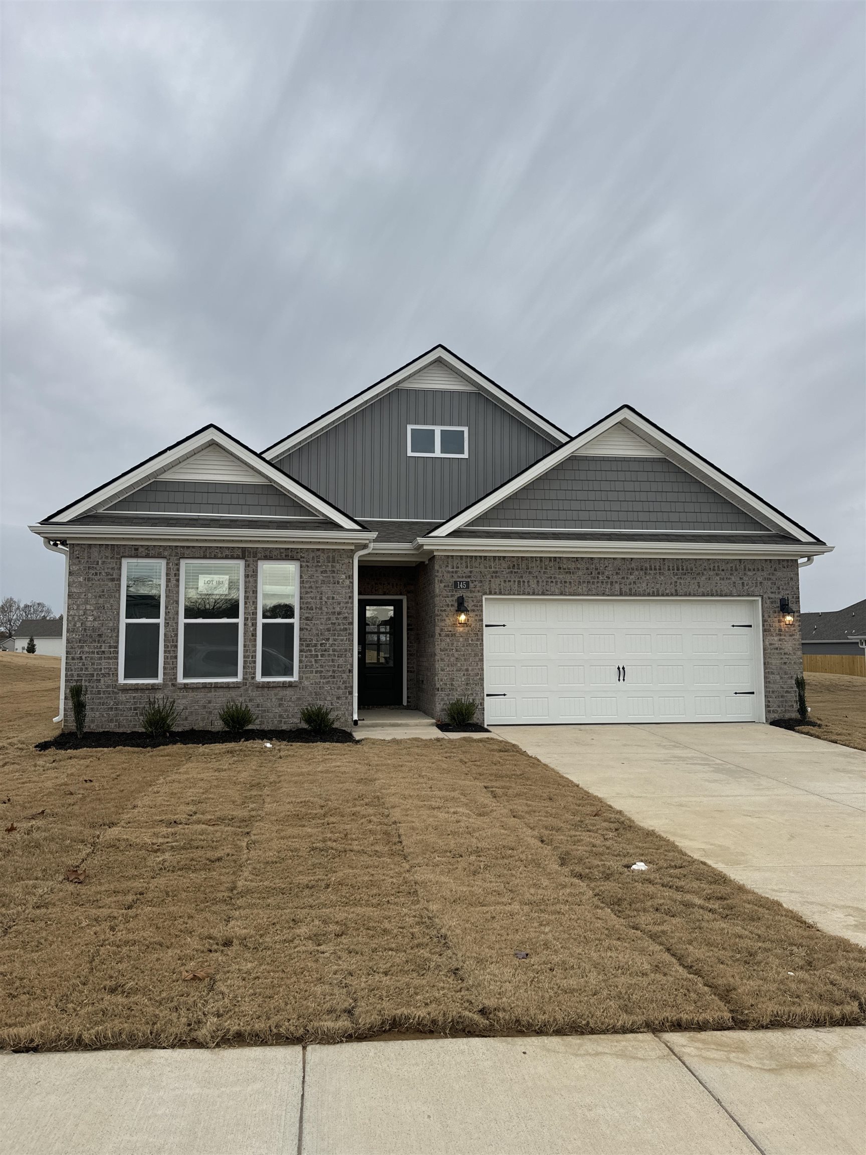 View of front of home with a garage