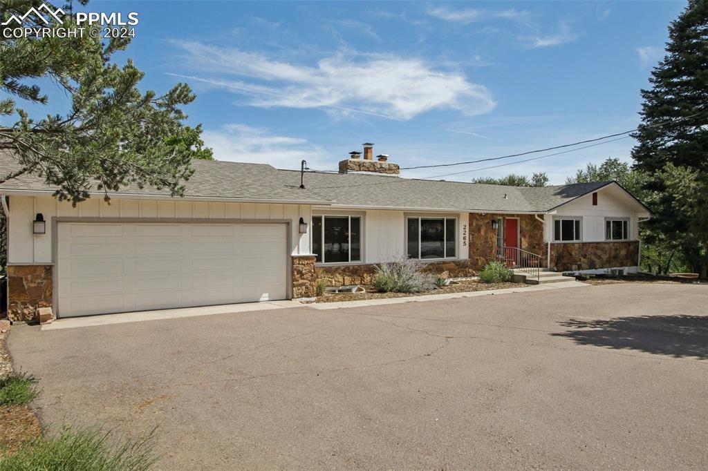 front view of a house with a patio