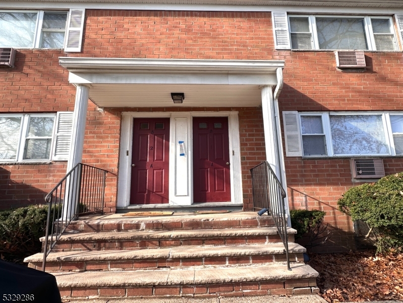 a front view of a house with a balcony