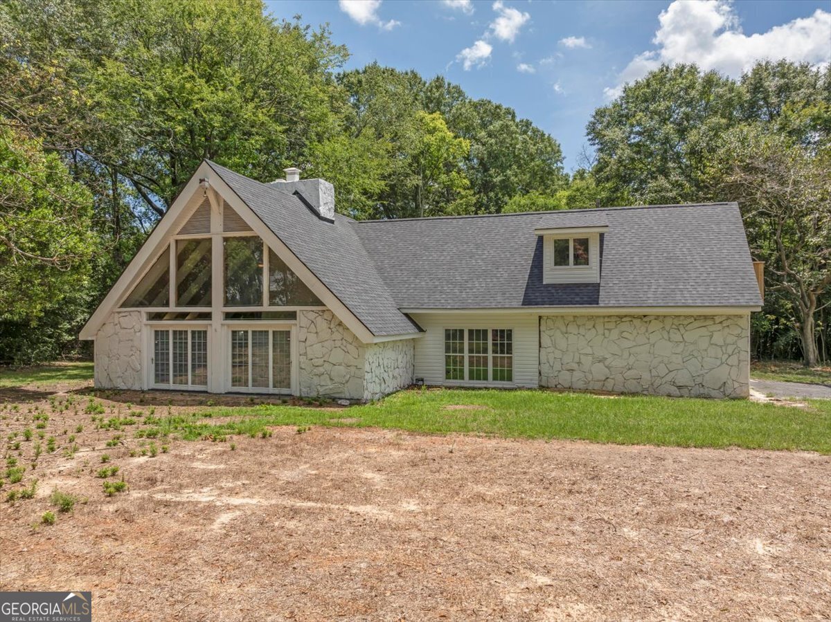 front view of a house with a yard