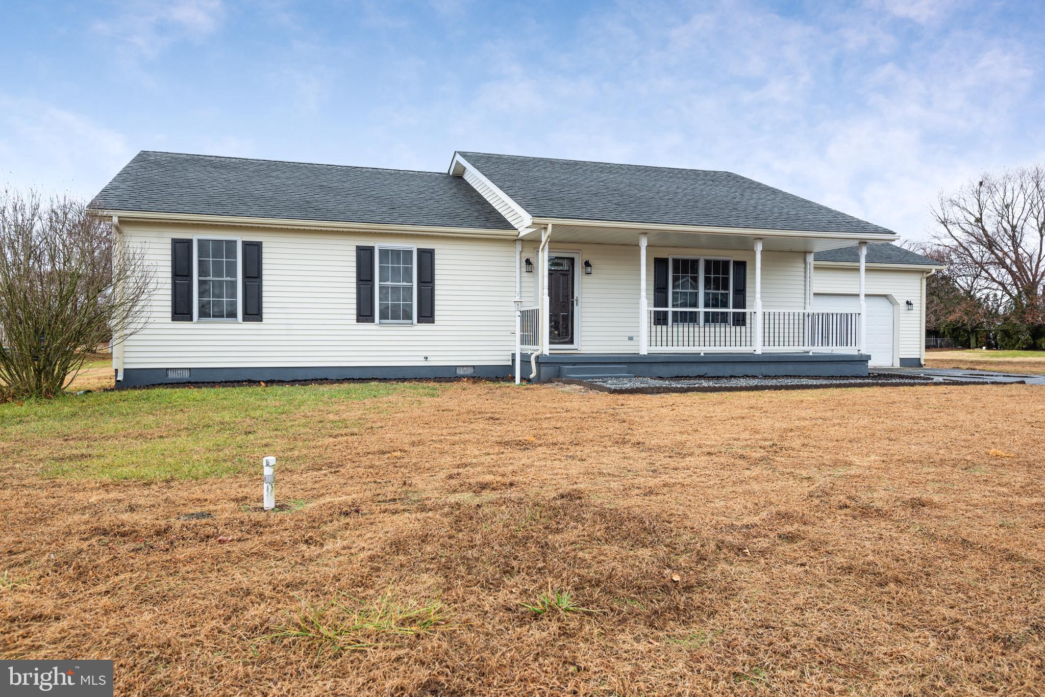 a front view of house with yard