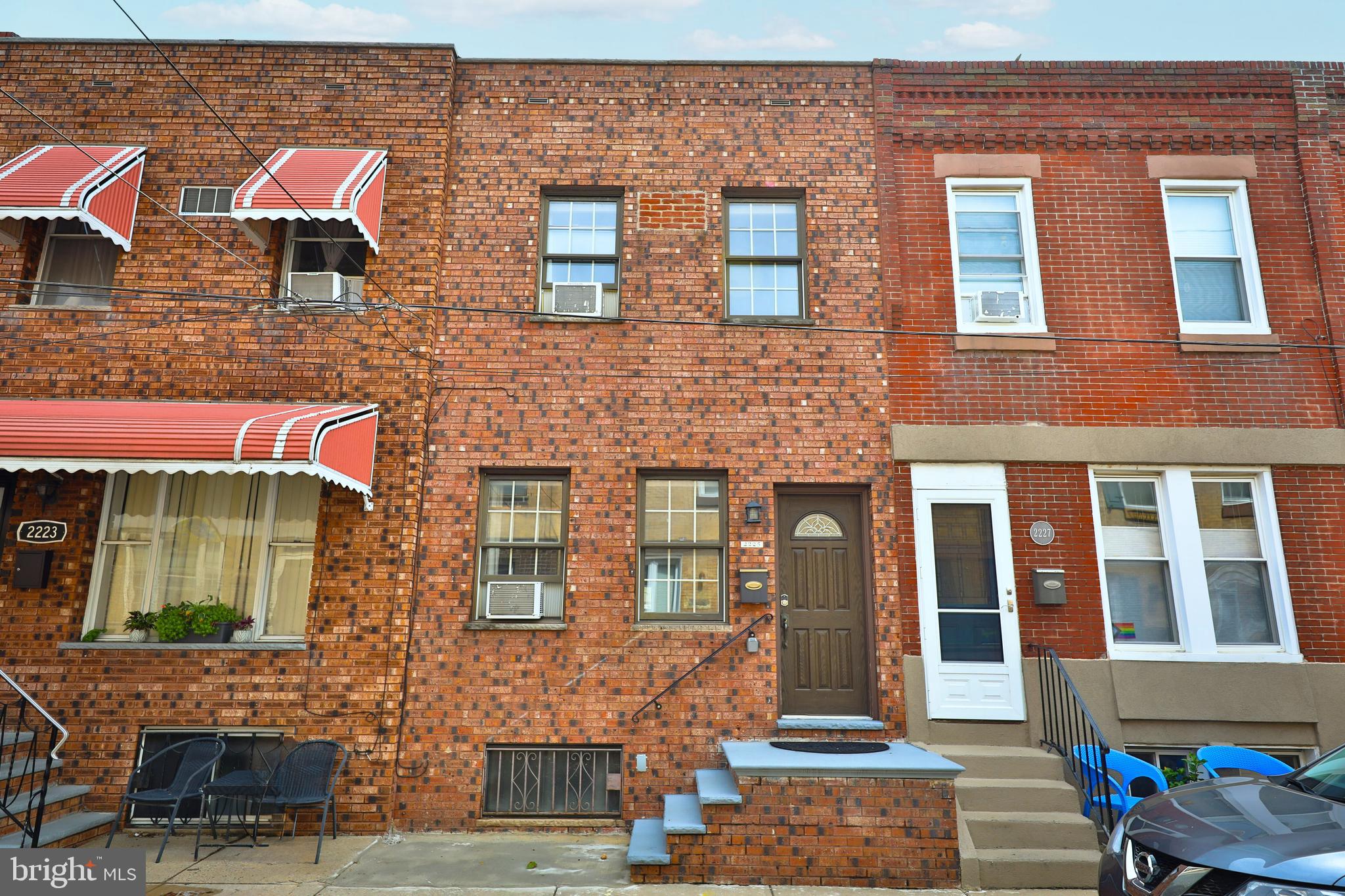 a front view of a multi story residential apartment building