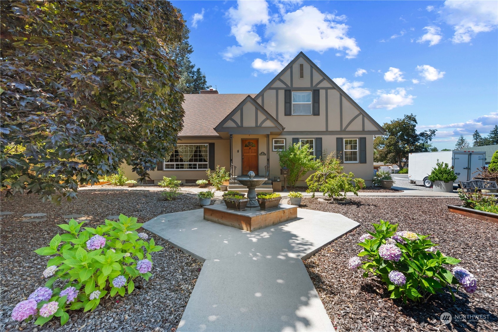 a front view of a house with a patio