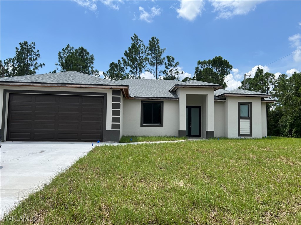 front view of a house with a yard