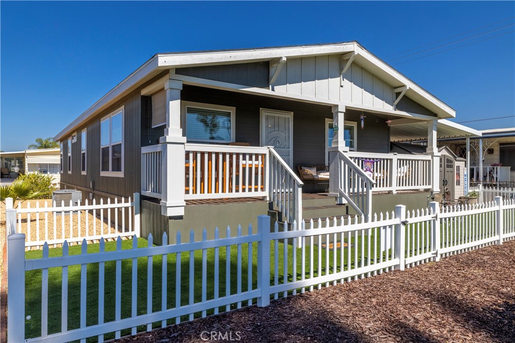 a front view of a house with a porch