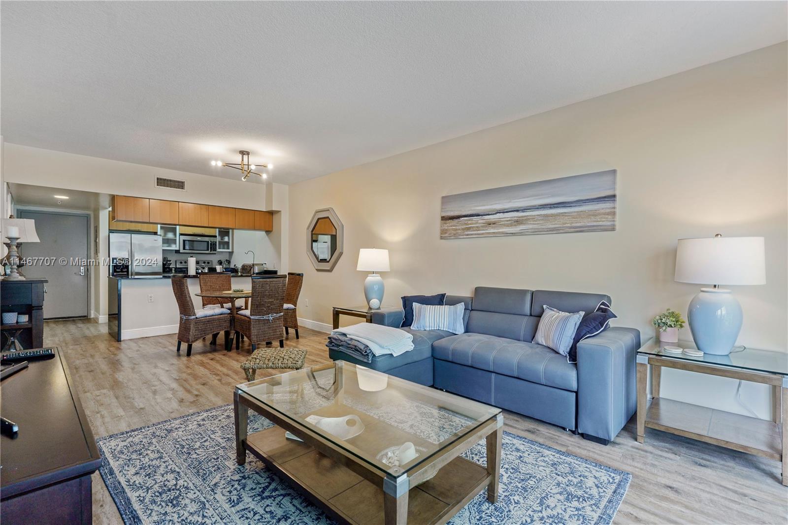 a living room with furniture and a table