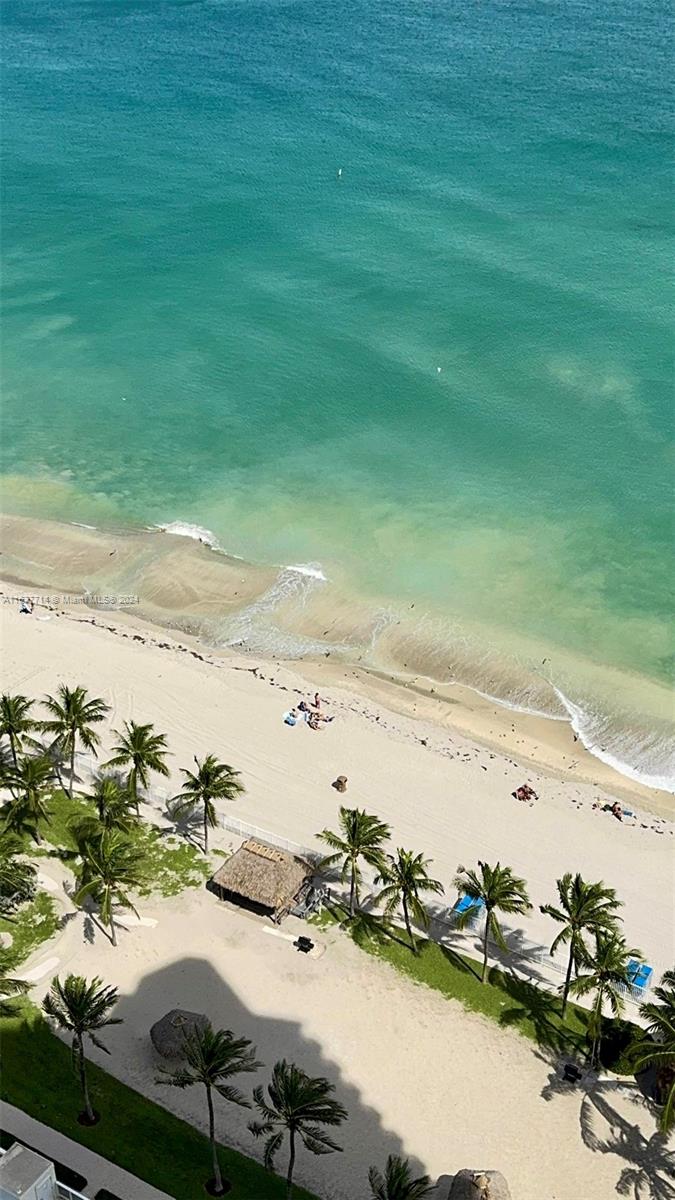 a view of beach and ocean