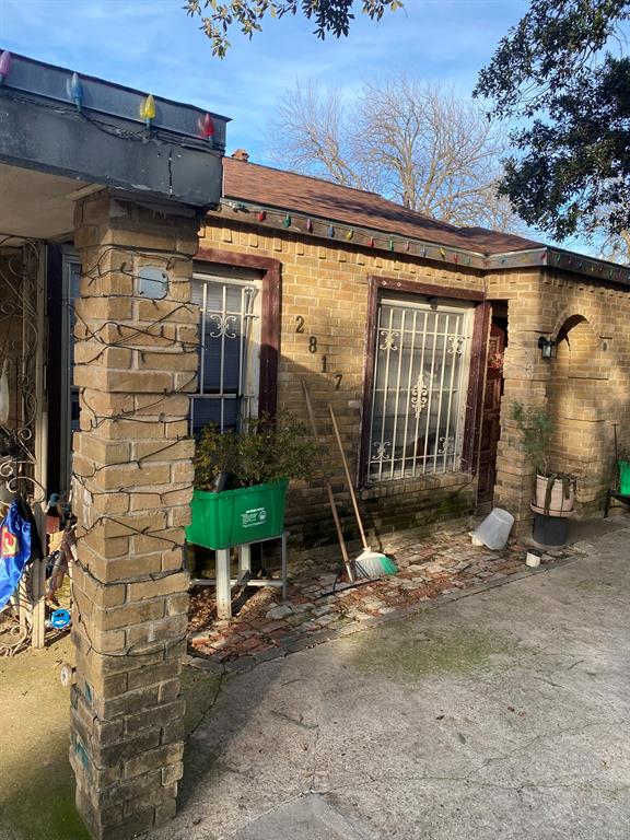 a front view of a house with a garage