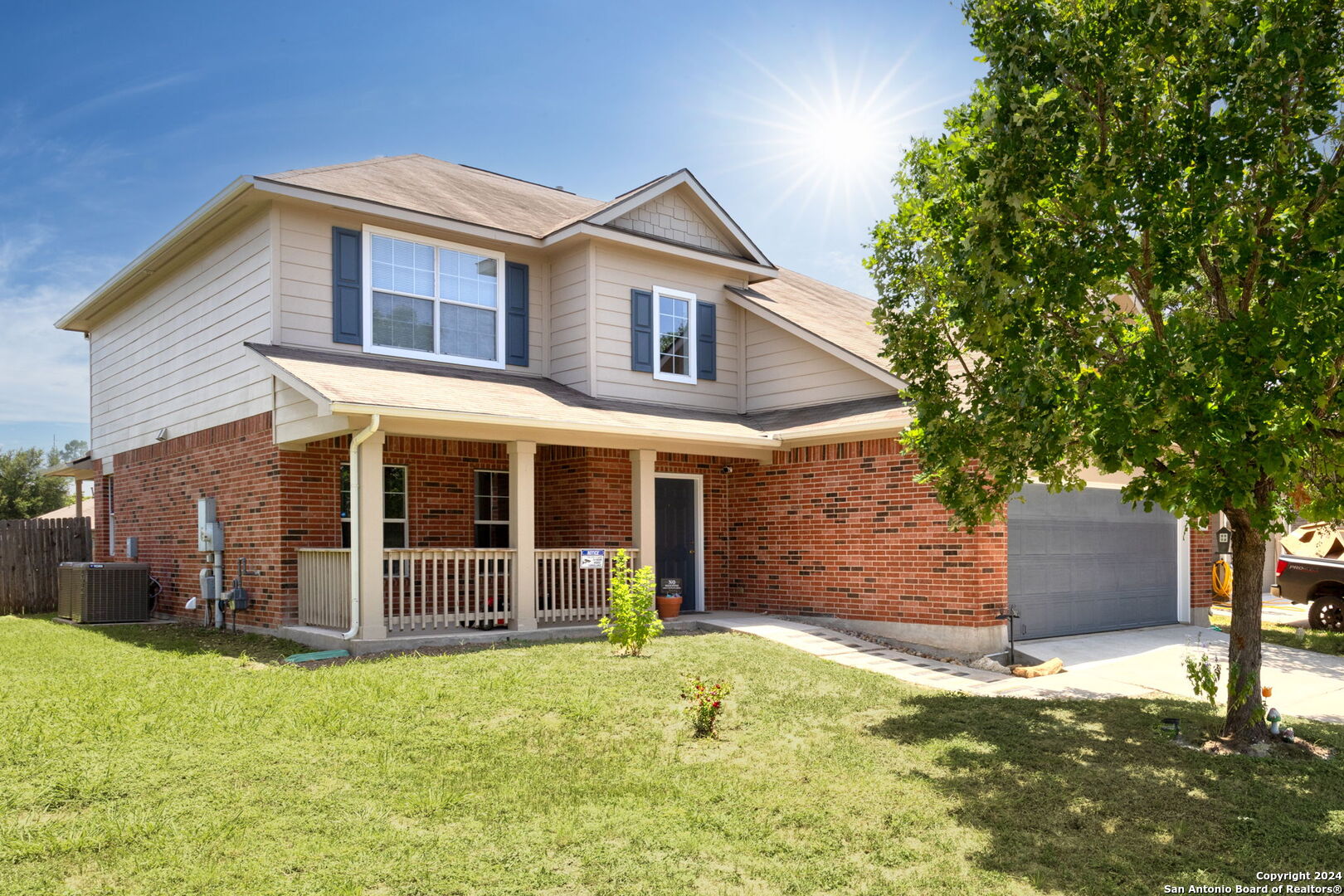 front view of a house with a yard