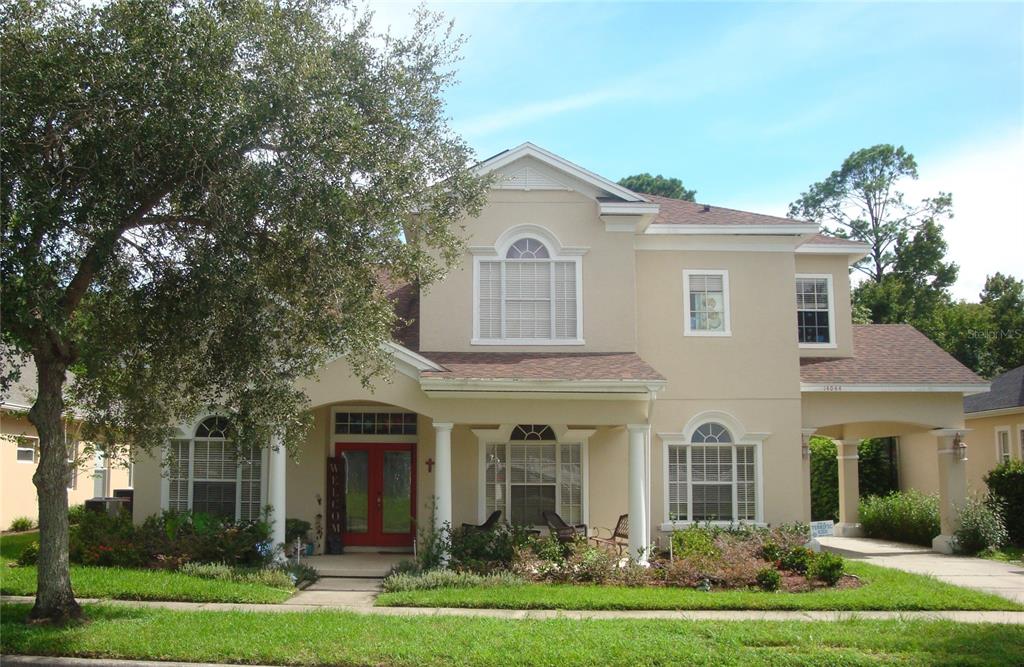 front view of a house with a yard