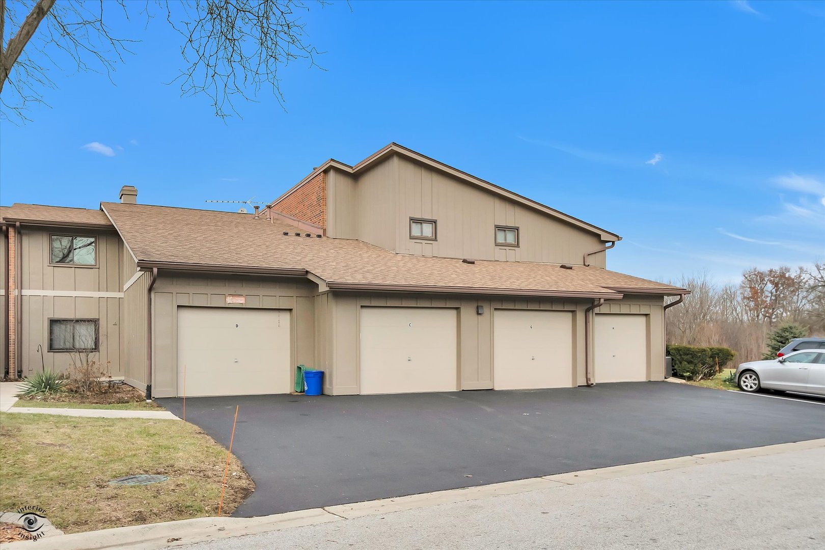 a front view of a house with a garage