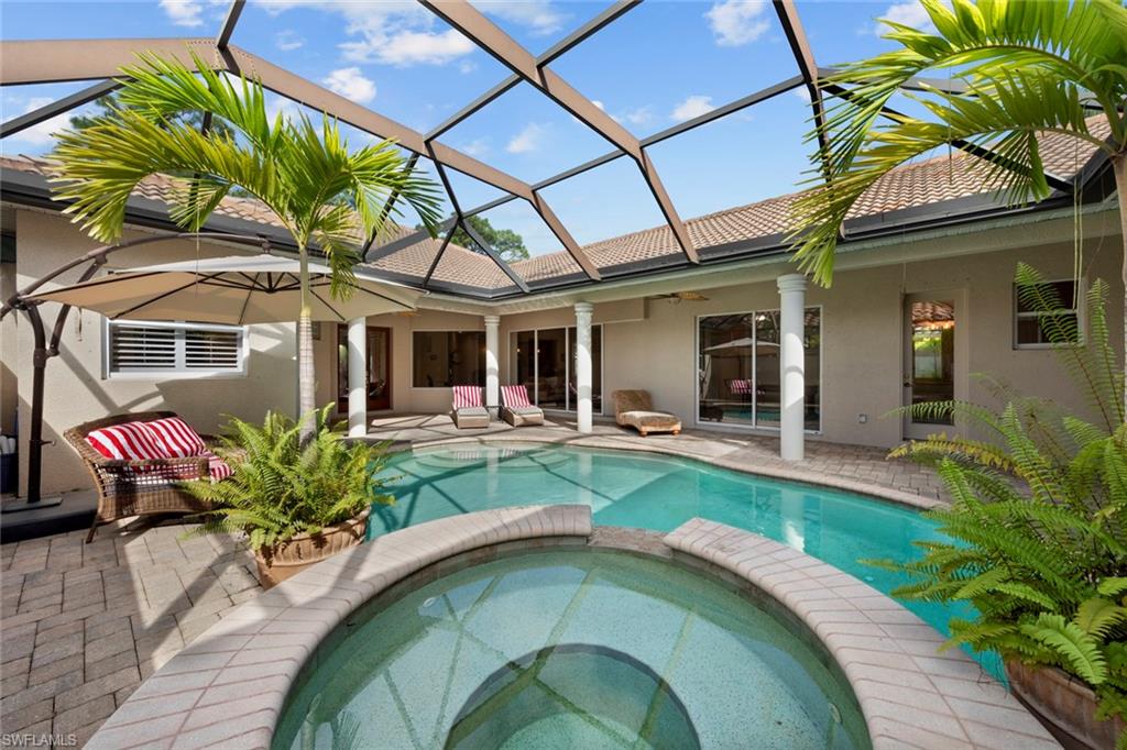 View of courtyard with pool/spa, entry to main home to left