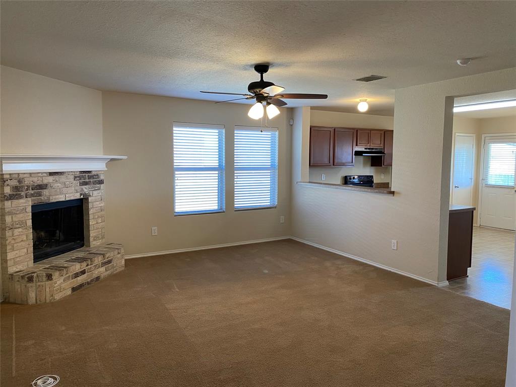 a view of a livingroom with a fireplace