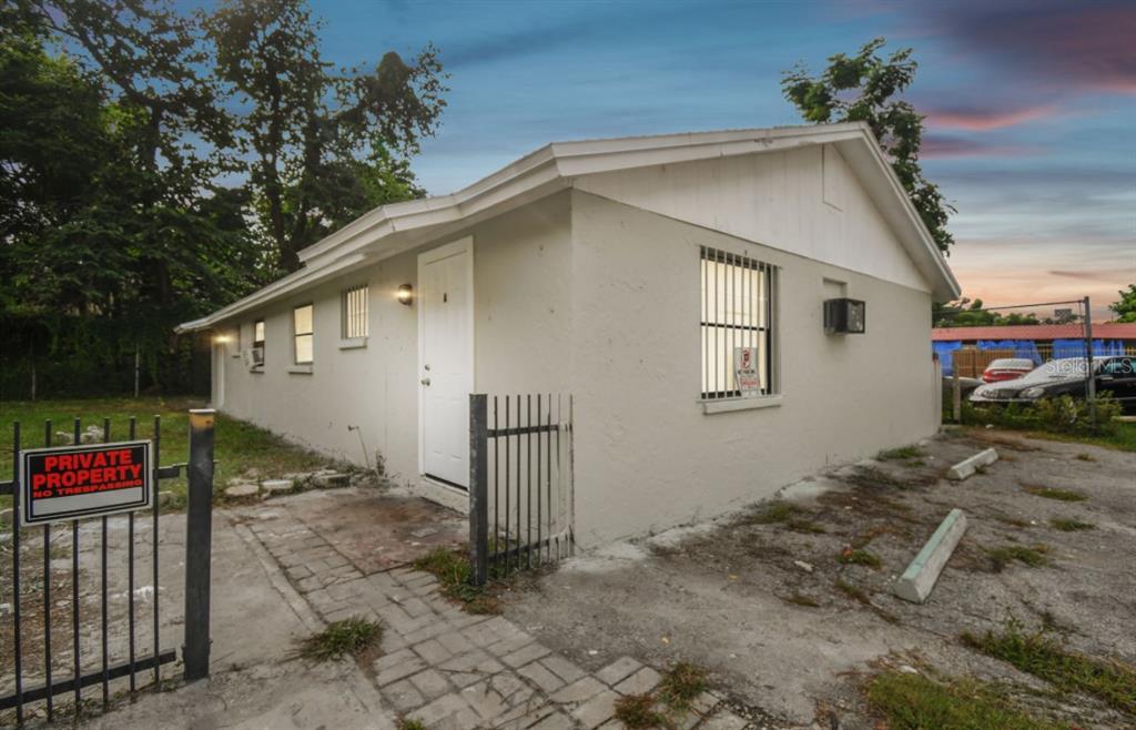 a house with trees in front of it