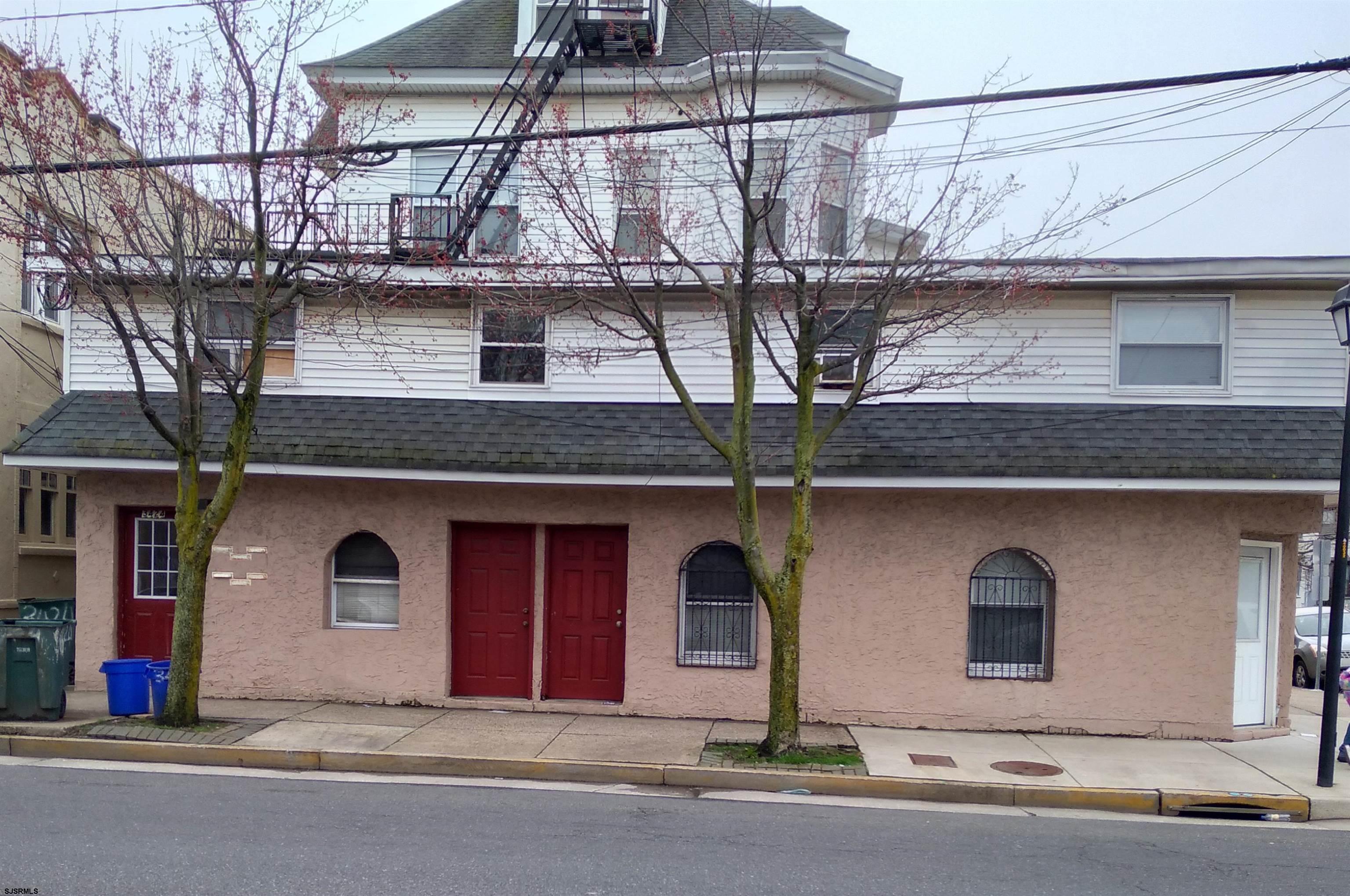 a front view of a house with a garage