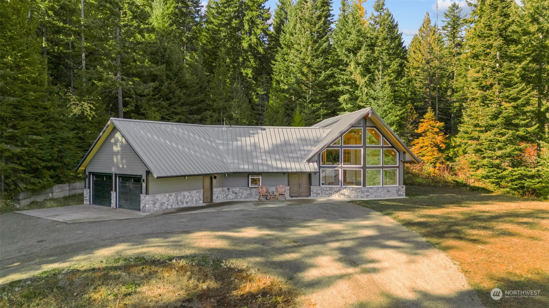 a house with trees in the background