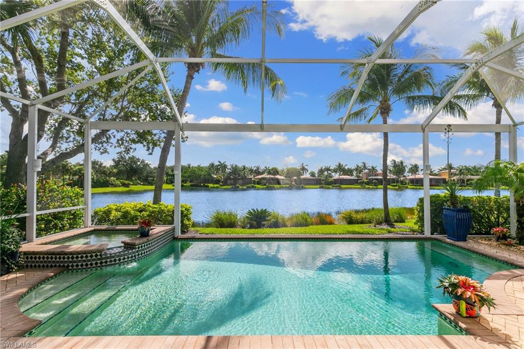 a view of a swimming pool with a patio