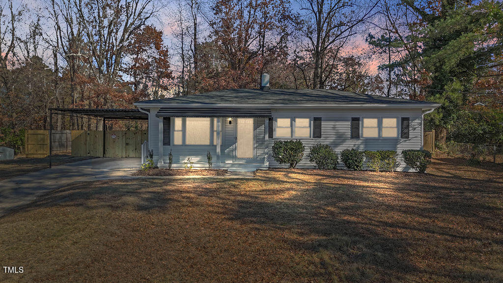 front view of a house with a yard