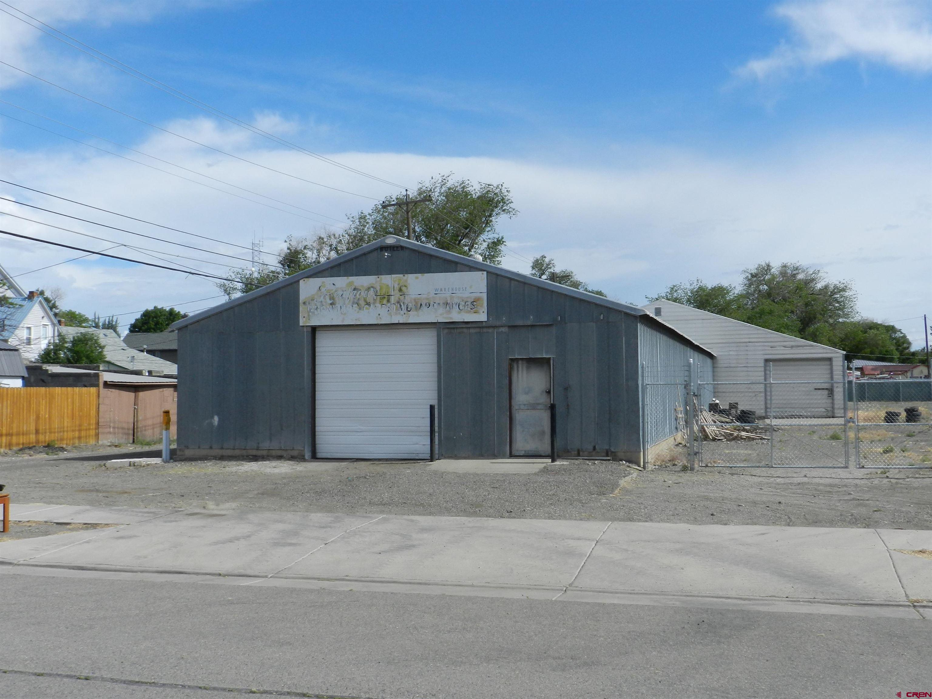 a front view of a house with a garage