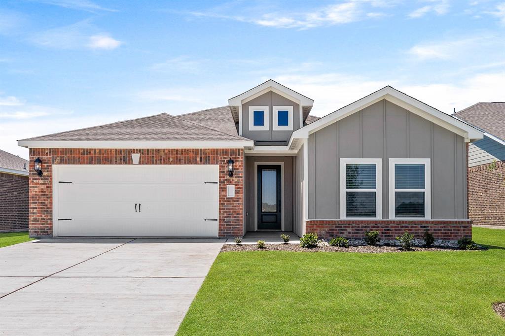 front view of house with a yard