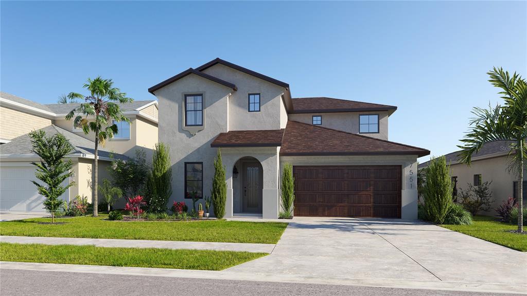 a front view of a house with a yard and garage