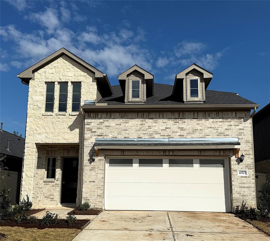 a front view of a house with yard