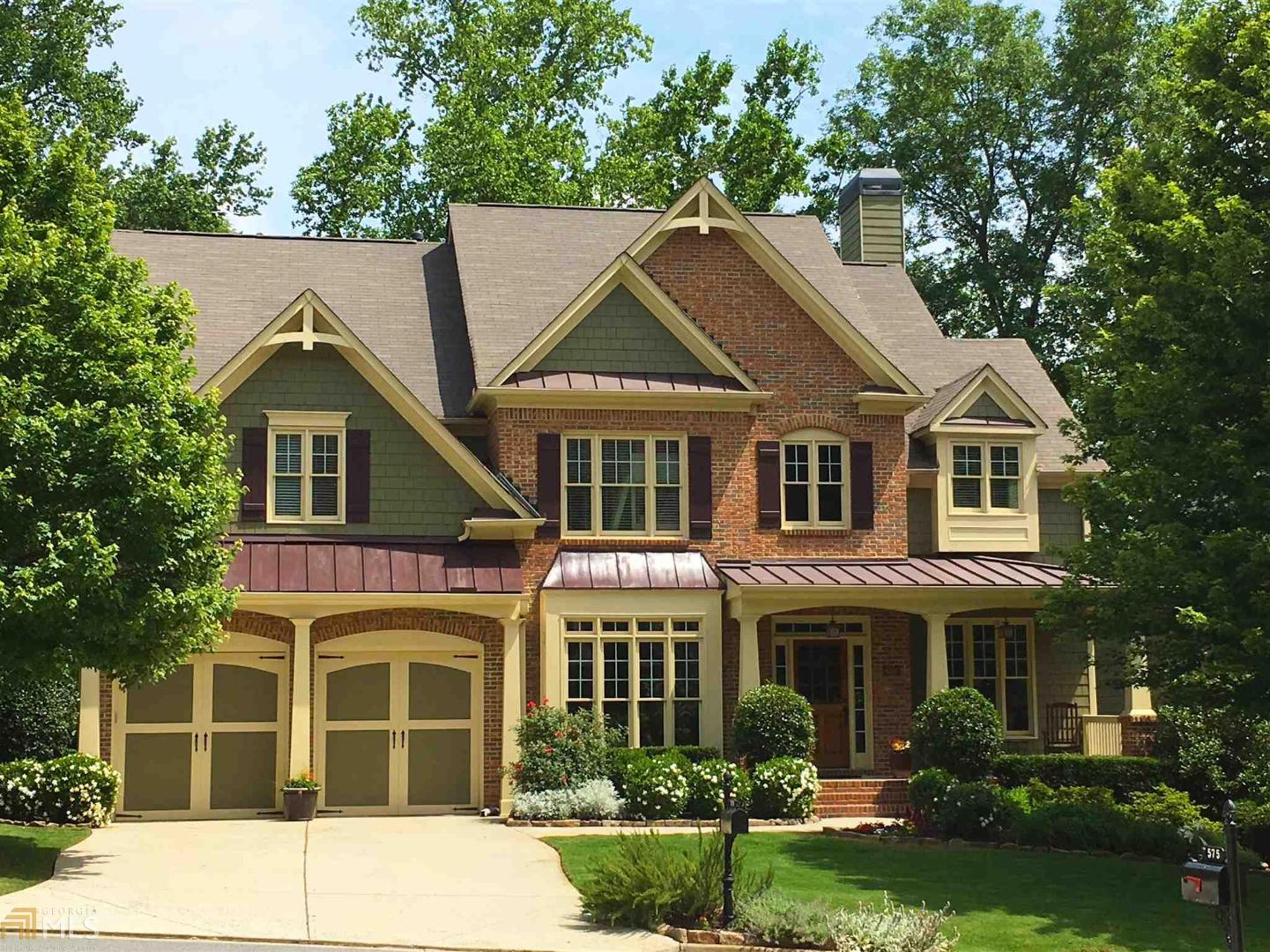 a house view with a garden space