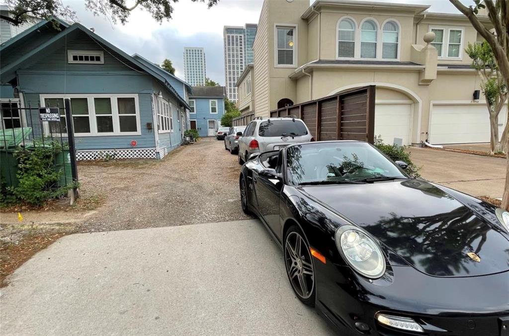 a front view of a house with garage