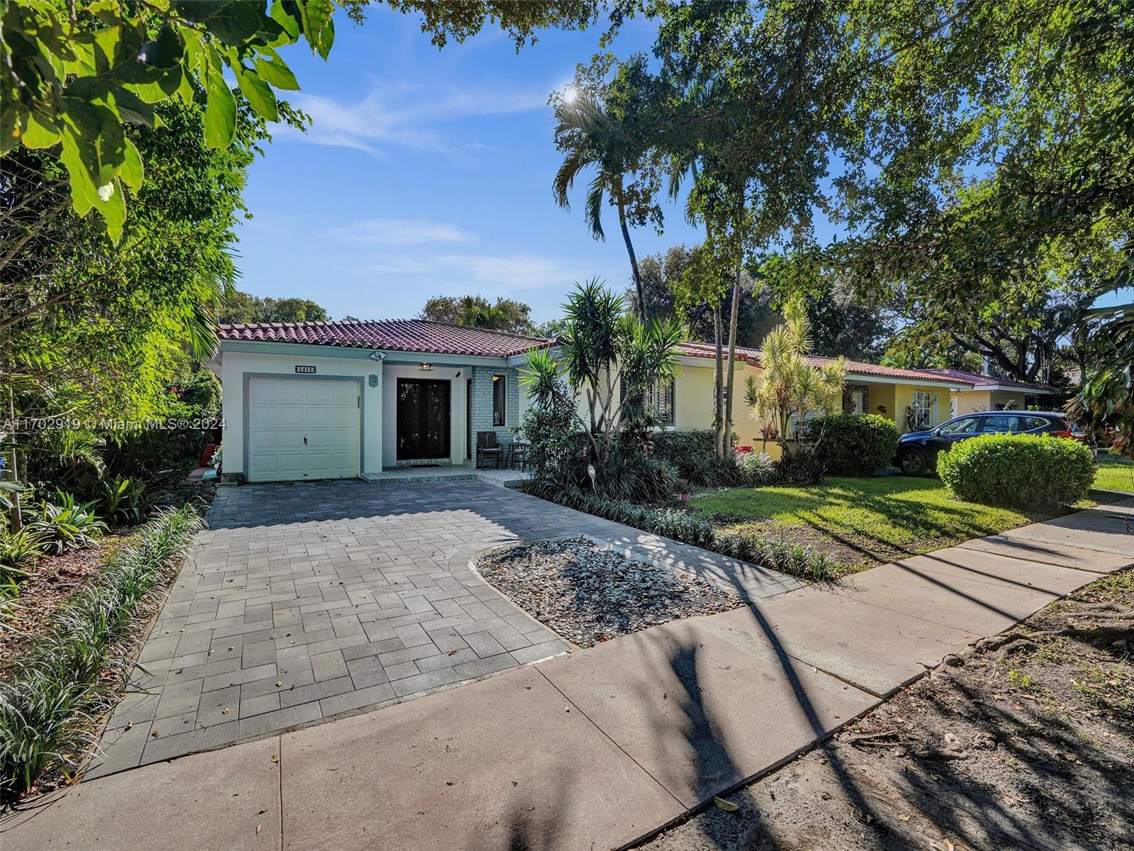 front view of house with a yard