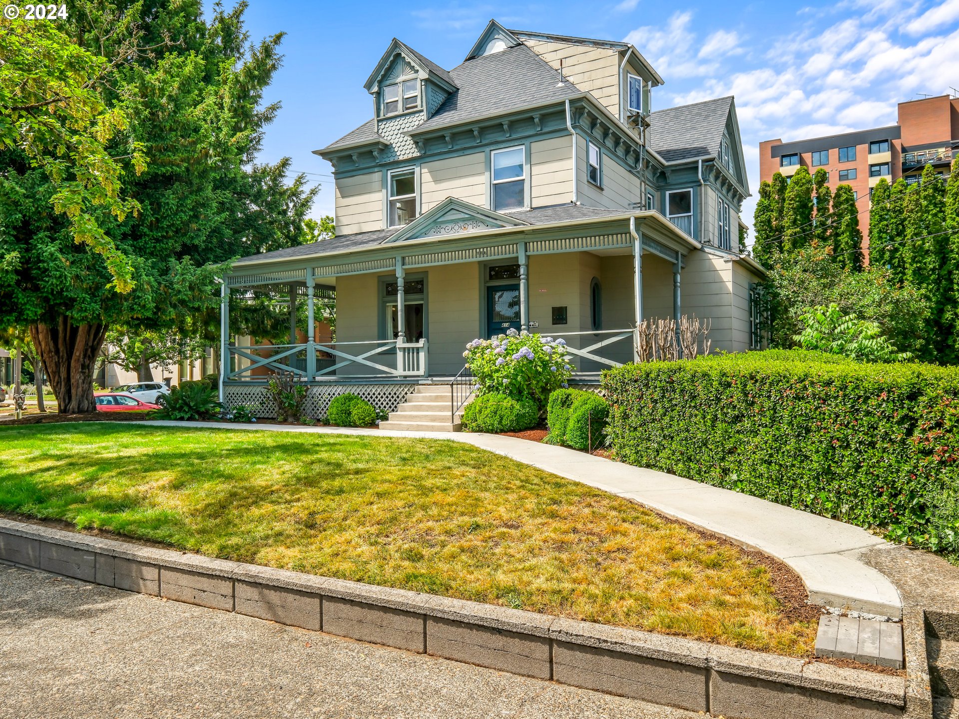 a front view of a house with garden