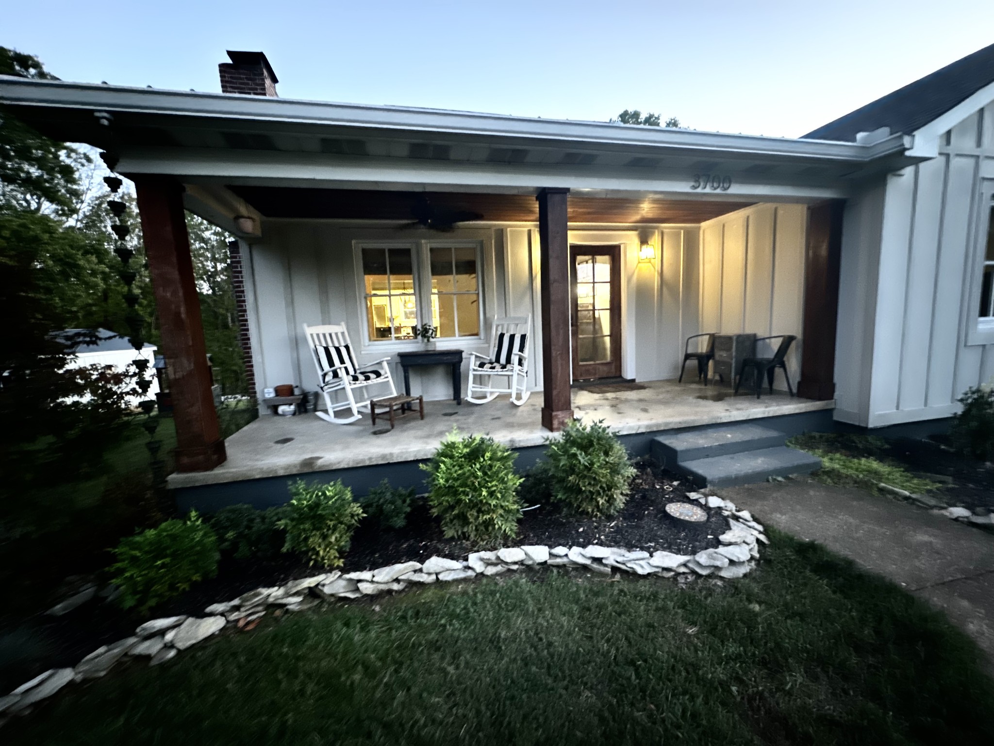 a front view of a house with a porch