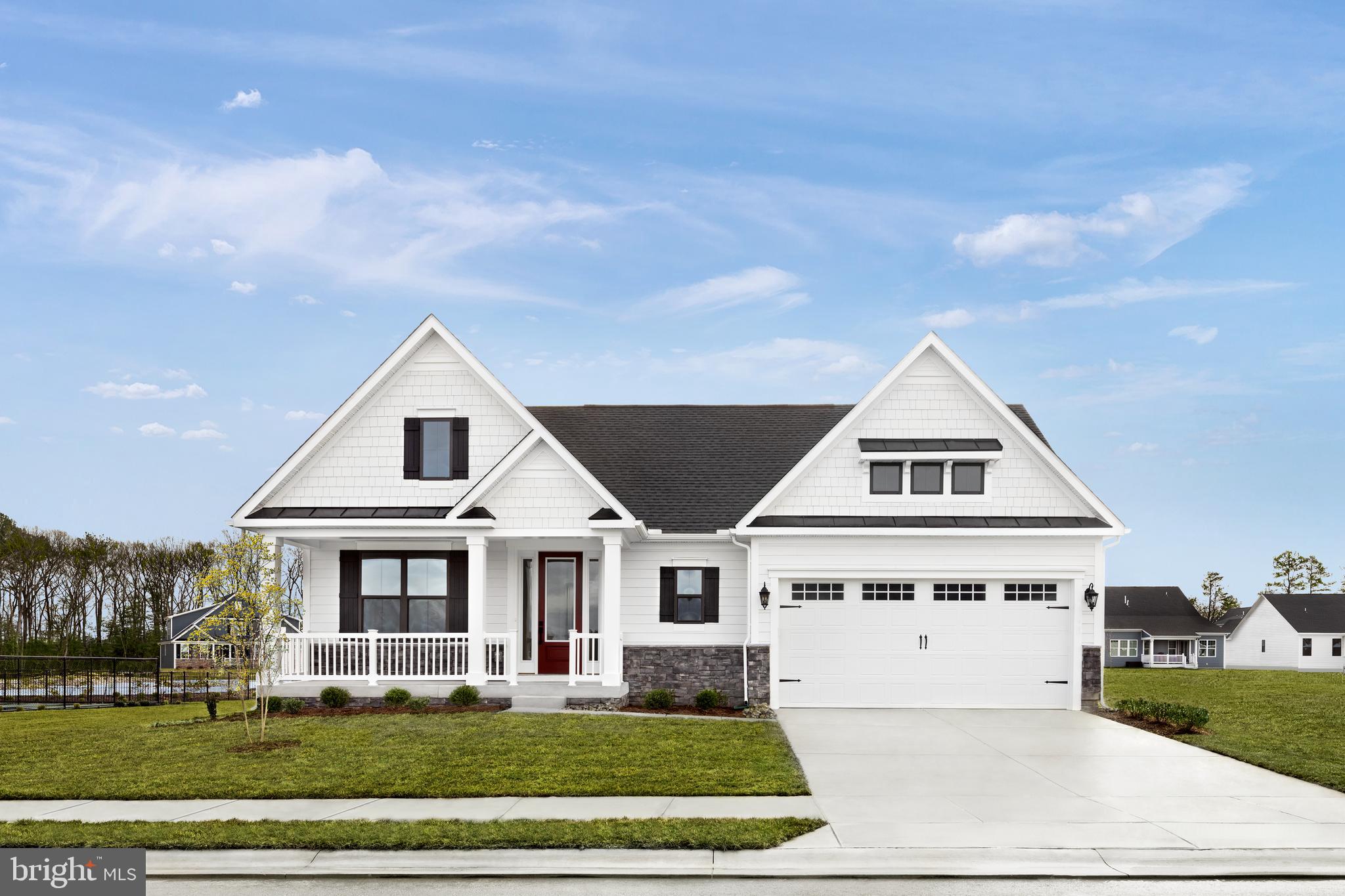 a view of house with yard