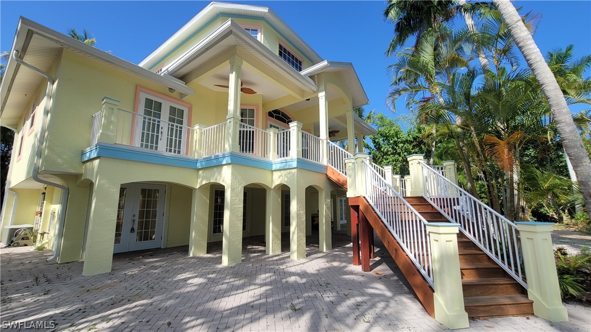 a view of a house with iron stairs