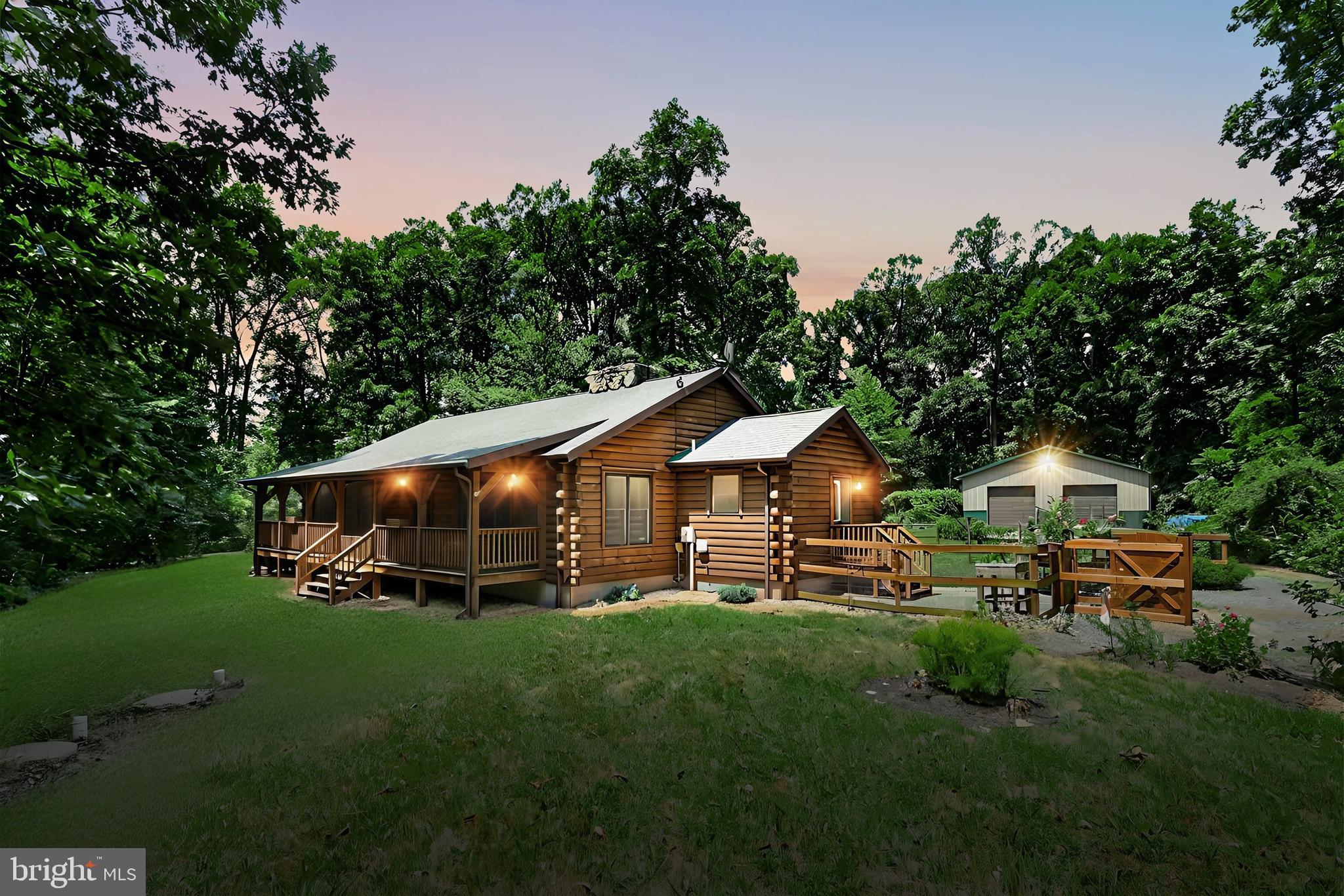 a view of a house with a yard porch and sitting area