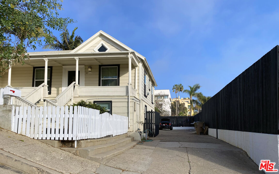 a front view of a house with a porch