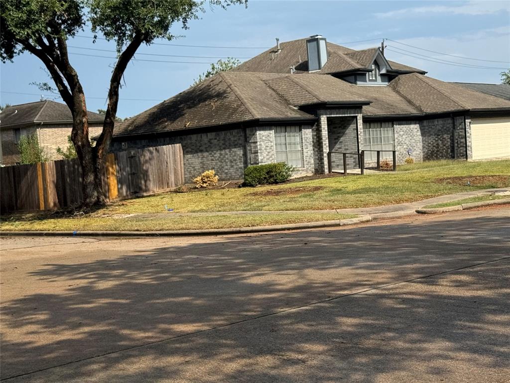 a view of a house with a large space and a large space