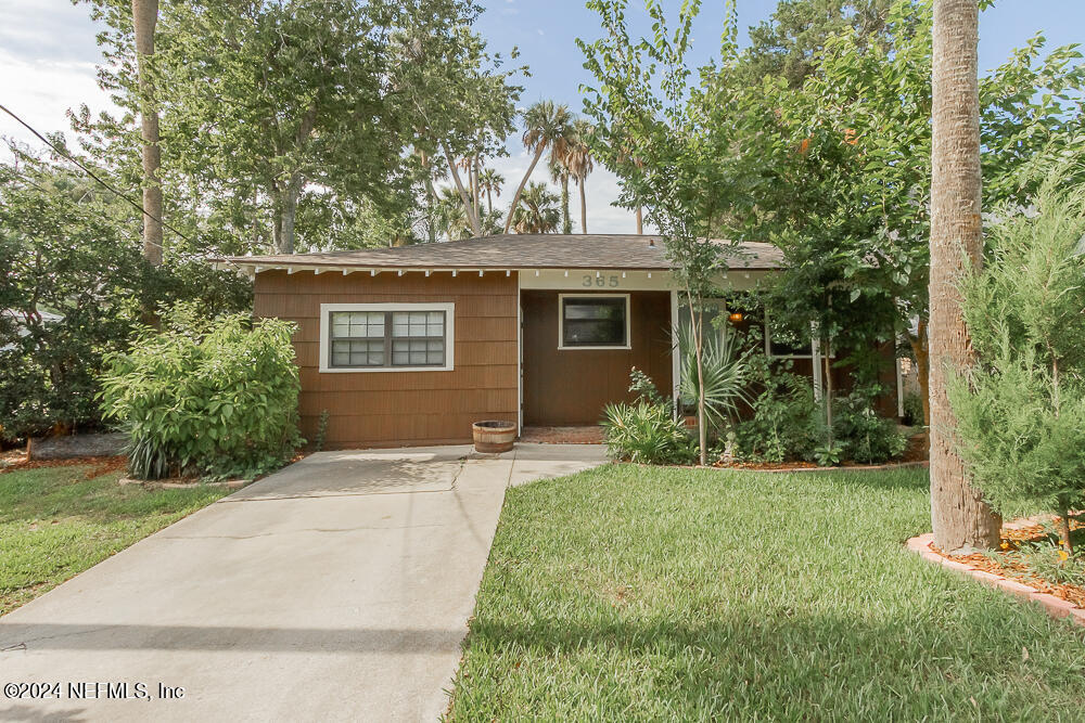 front view of house with a yard