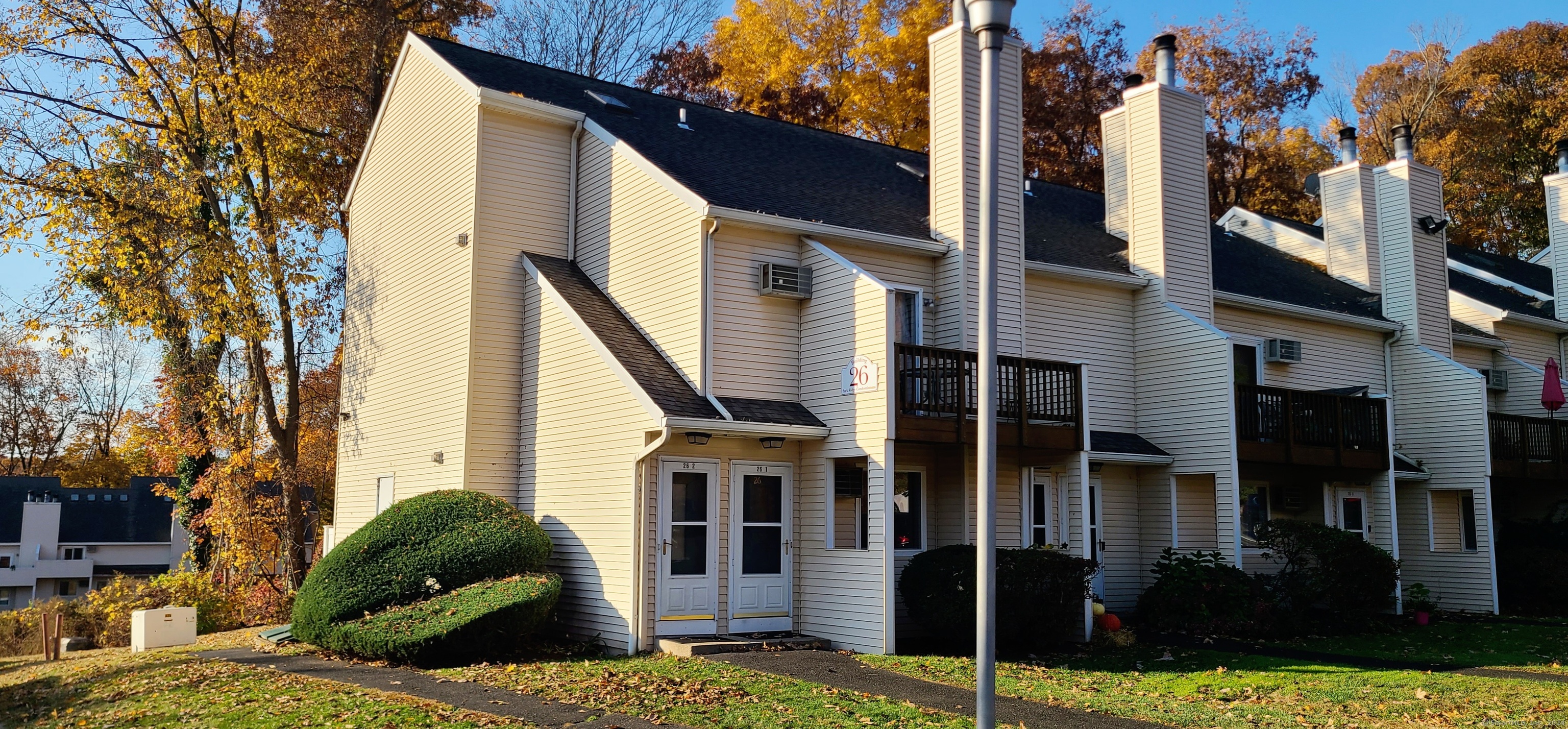 front view of a house with a yard