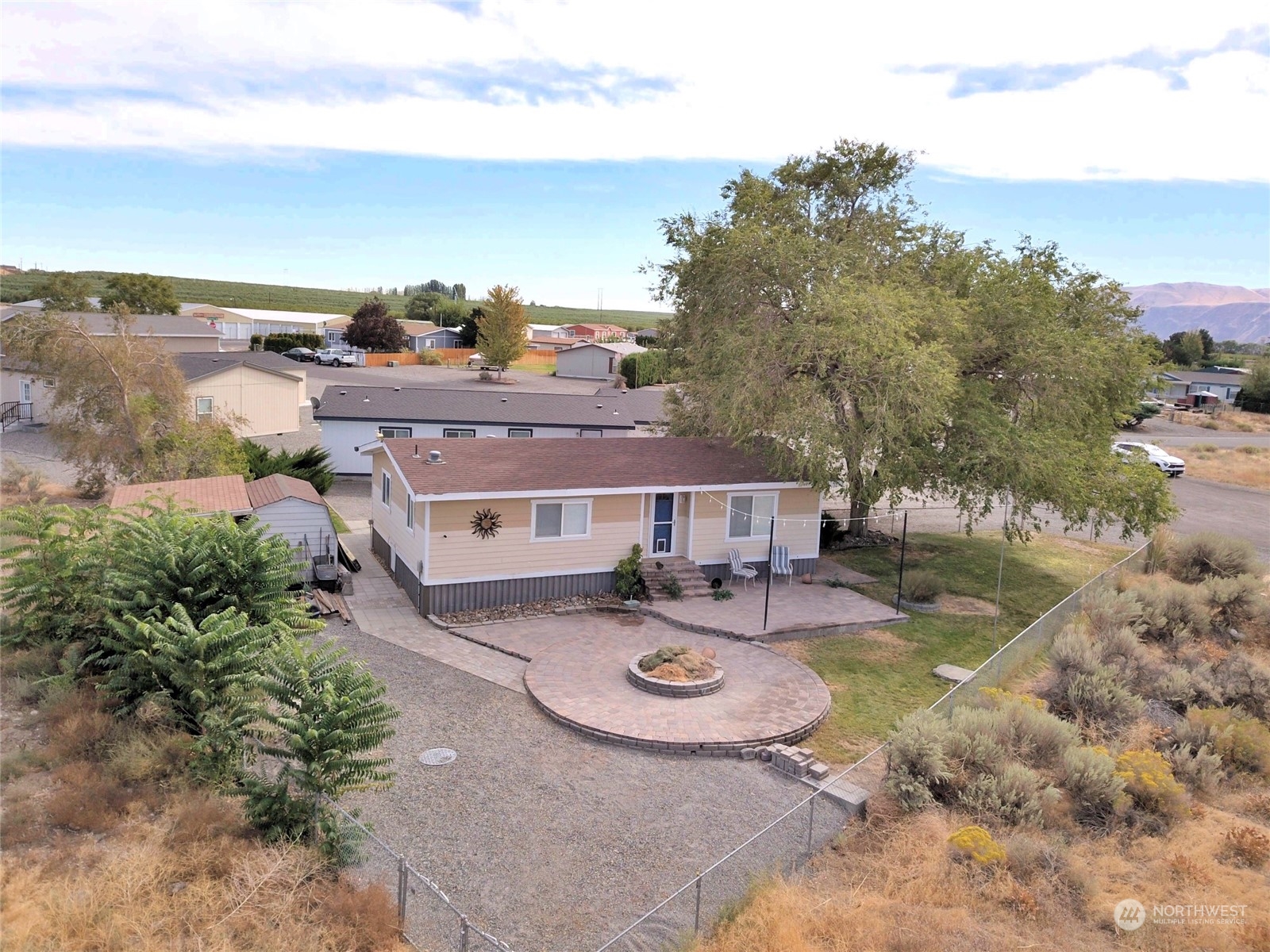 an aerial view of a house with outdoor space