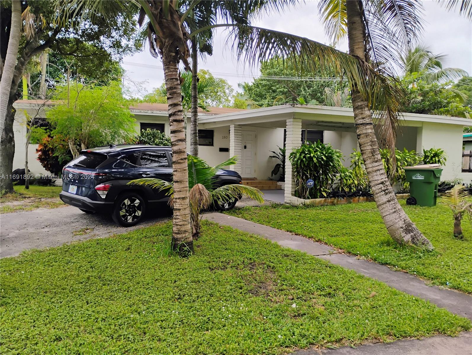 a house view with a garden space