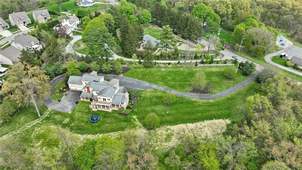 Aerial Pic of home on 4.13 acres offering privacy yet convenient location.