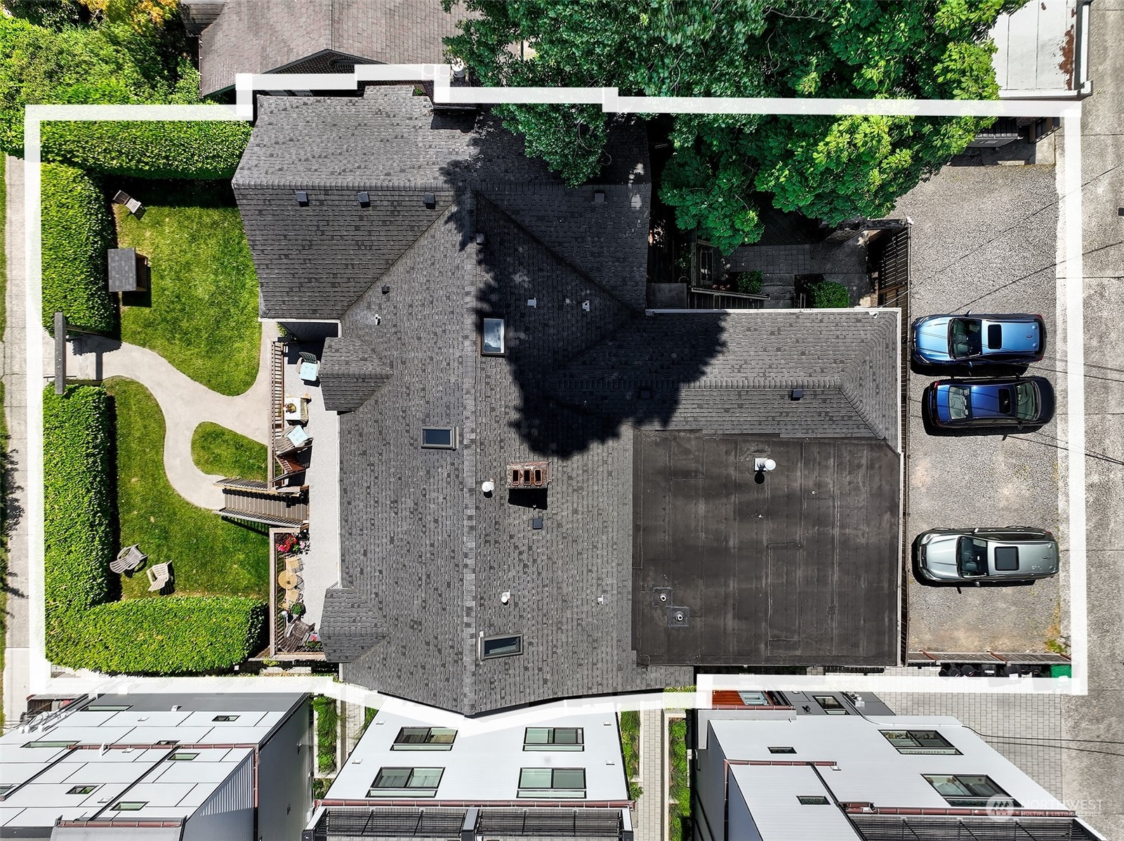 an aerial view of houses with outdoor space