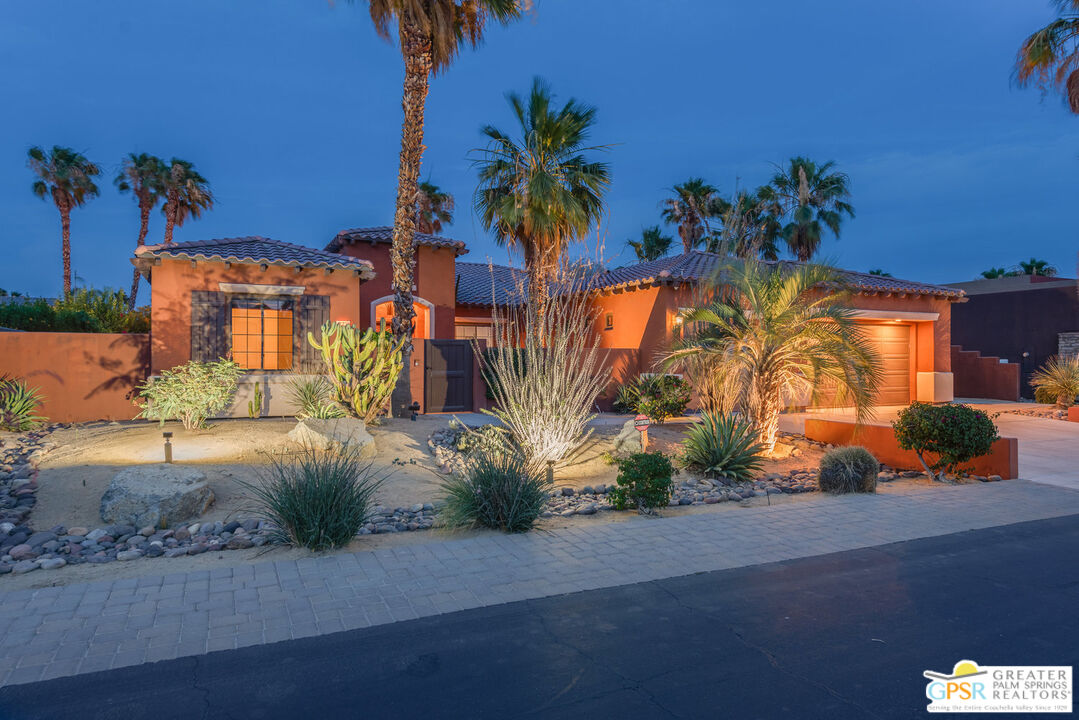 an ocean view with palm trees