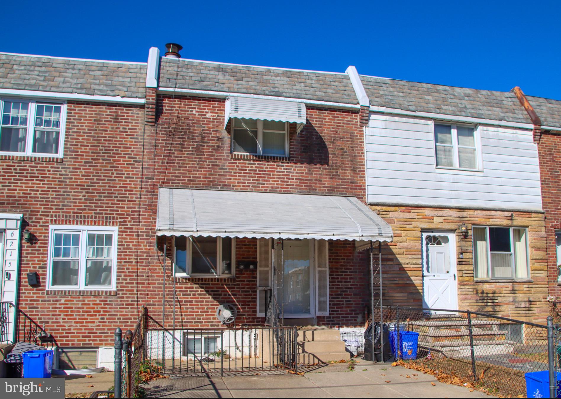 a front view of a house with a garage