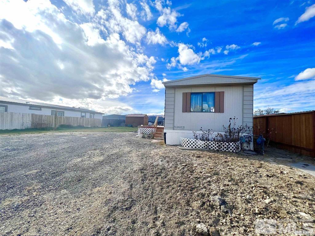 a house view with a backyard space