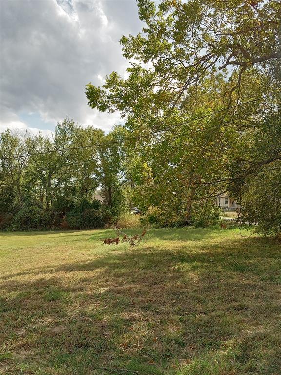 a view of a field with an outdoor space