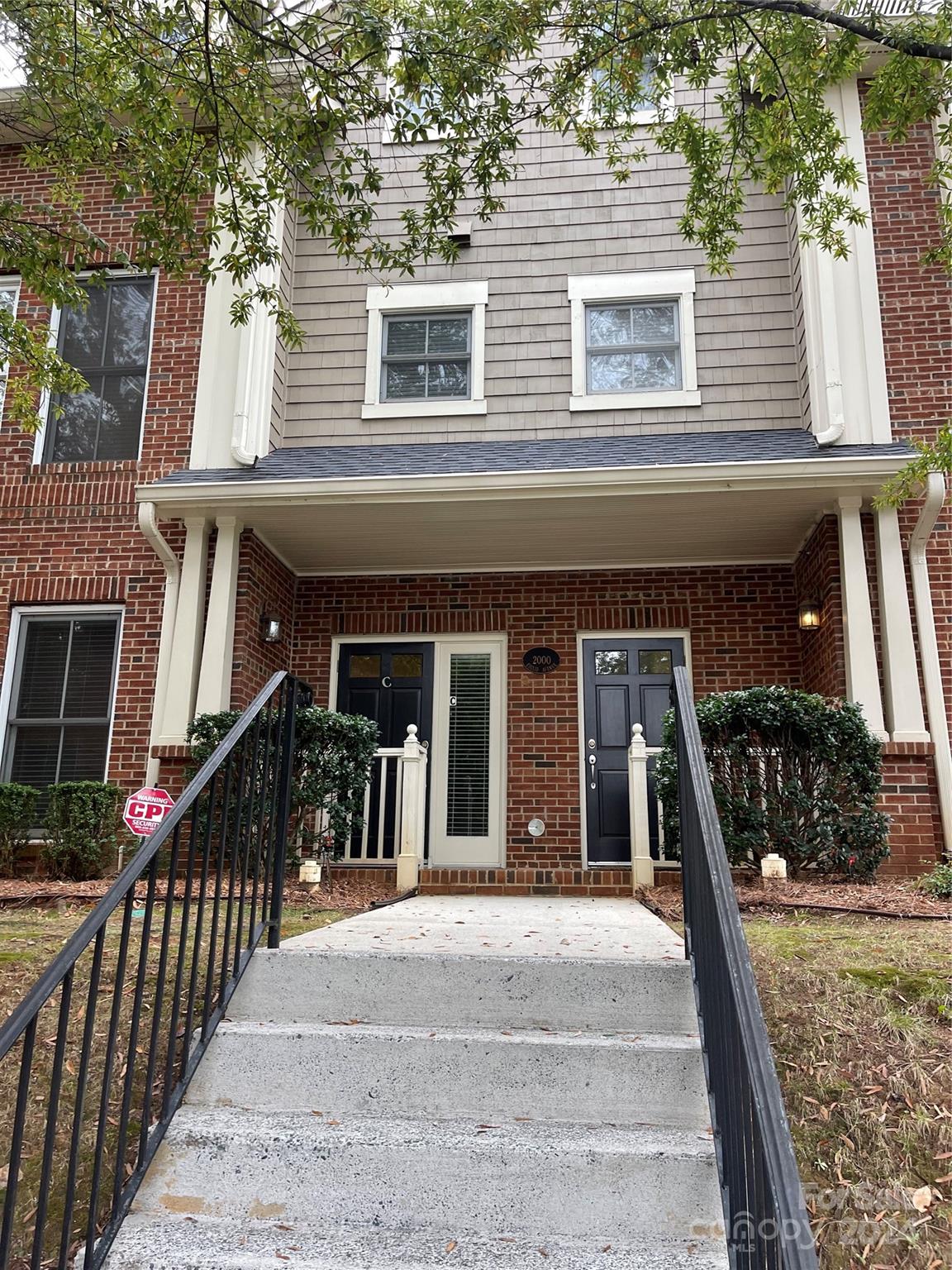 a view of a house with a porch